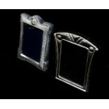 Two small silver photograph frames, 8.3 x 6cm and 8.4 x 7cm.