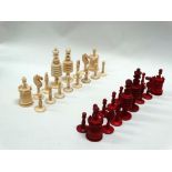 Chess - A full set of thirty two (16 & 16) turned bone, mahogany box chess pieces, white and stained
