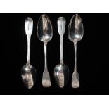 A set of four silver 'Fiddle' pattern serving spoons, three London 1817, and maker's mark for