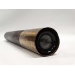Sea telescope - A brass and leather bound 19th century single draw telescope with reflection