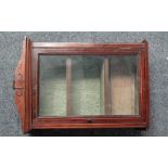 Hanging wall cabinet - A rosewood and mahogany strung inlaid glaze fronted cabinet with three