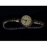 Buren - A 9ct gold watch with expanding bracelet.