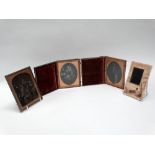 Three quarter-plate ambrotype portraits comprising: two of an elderly lady, each in morocco case,