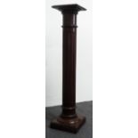 Edwardian style oak torchiere - A fluted pillar bust stand with squared base, height 111cm, 24cm
