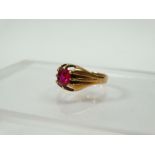 A 9ct gold ring set a faceted ruby, size M/N.