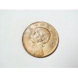 COINS - A Chinese 1 Yuan coin.