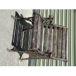 A cast iron framed and wooden slatted garden chair, circa 1900, height 72cm, width 54cm.
