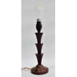 Bakelite electric lamp - A triple turned tapering column on circular base, height 31cm.