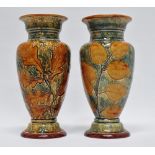 Doulton Lambeth - A pair of Leafware baluster vases, No.r00 and maker's mark ER to base, height 22.