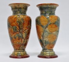 Doulton Lambeth - A pair of Leafware baluster vases, No.r00 and maker's mark ER to base, height 22.