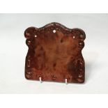Newlyn Copper - A plaque repousee decorated with fish, sea shells and C scrolls to the edge,