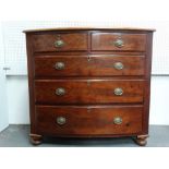 Early Victorian bow front chest of drawers - A mahogany two short over three graduated long drawers,