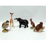 Beswick animals - An elephant with raised head and trunk, a giraffe, a kangaroo No.2312, a beaver