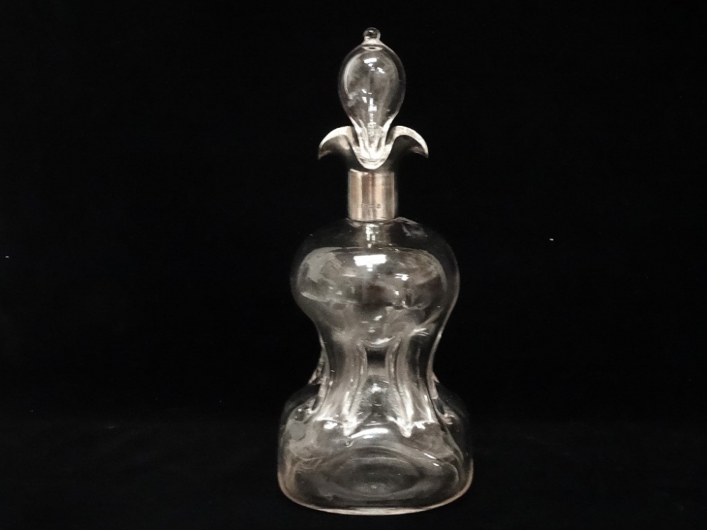 An early Edwardian pinch glass decanter with silver quatreform pourers to top, Birmingham 1902,