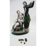 Wiener Werkstatte - A ceramic polychrome group of two figures, one a seated bather, the other