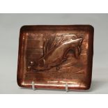 Newlyn Copper - A repousee decorated square dish depicting a fish, height 0.7cm, 11.7 x 14.3cm.