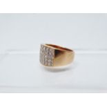 18ct gold and diamond ring - A pave set diamond ring with five rows of nine diamonds, marked .750,