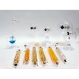 Scientific instruments - Thirteen glass instruments, to include four pedestal vacuum spinners and