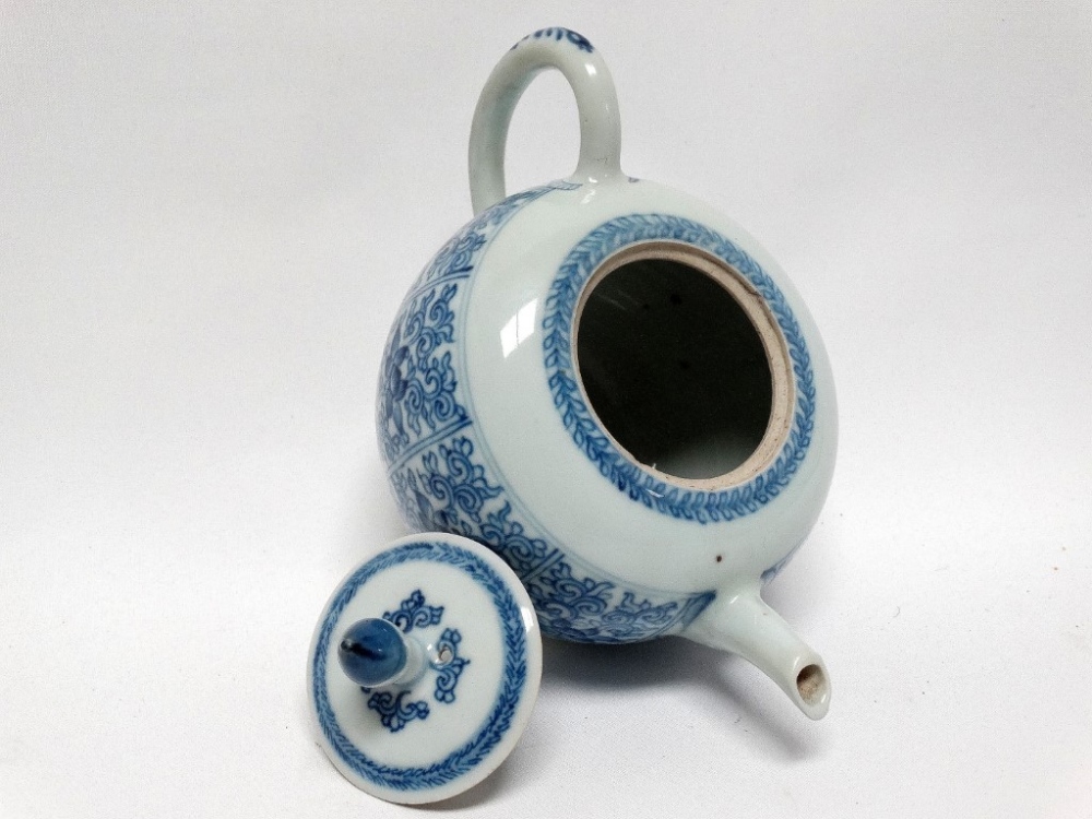 Circa 1900 Chinese lidded teapot - A blue and white peony and scroll decorated teapot, height 11.5. - Image 4 of 4