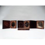A sixth-plate daguerreotype of a seated lady, gilt highlights, in folding morocco case; two sixth-