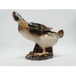 20th century Chinese - A hand painted and glazed ceramic figure of a duck preening, impressed '