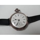 Early wristwatch - A circa 1910 .800 cased top wind wristwatch (12 at 90 degrees) colour hardened