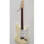 Guitar - A Squier by Fender electric guitar.