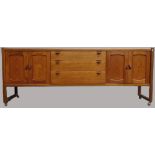 Mid Century Furniture - A Nathan teak sideboard with three graduated drawers flanked by two pairs of