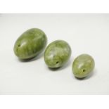 Nephrite / Jadite - A collection of three green egg shaped pendants drilled for hanging, largest