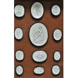 Grand Tour Intaglios - A shadow bow framed set of twelve oval plaster reliefs showing the Roman