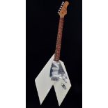 Guitar - A custom made guitar in Flying V style.