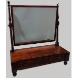 George IV Dressing Table Mirror - A mahogany mirror with turned supports, ebony stringing and with