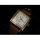 Art Deco Gentleman's Watch - A gold plated squared mechanical Rodania 17 jewels wristwatch with a