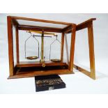 Scientific Scales - Griffin & Tatlock Ltd., mid 20th century, mahogany and oak with brass glazed set