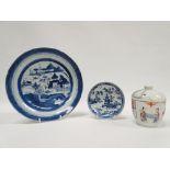 Chinese Ceramics - A hand painted blue and white dish decorated with a pagoda in a river