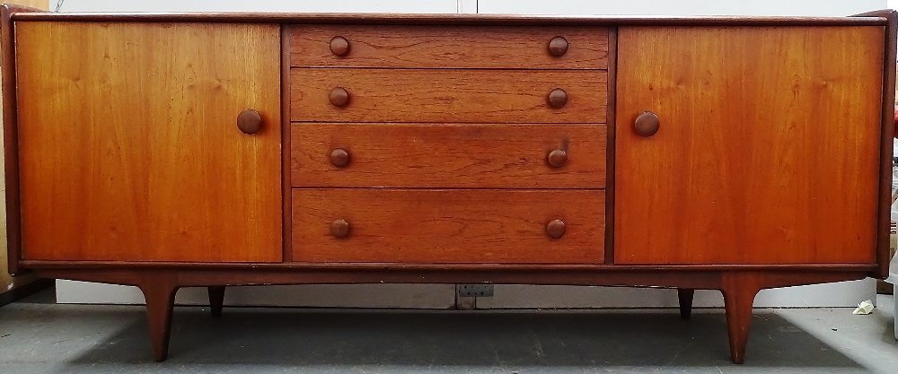 A. Younger Ltd - An afromorsia sideboard, comprising of four graduated short drawers, the top one