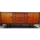 A. Younger Ltd - An afromorsia sideboard, comprising of four graduated short drawers, the top one