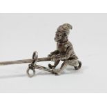 Rare Charm - A white metal detailed monkey wearing a long Georgian coat and hat and with articulated