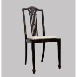 Chinoiserie Lacquered Chair - An early 20th century chinoiserie decorated black lacquered chair with