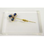 Diamond, Sapphire and Gold Tie Pin - A yellow metal pin with an insect shaped top and three pear