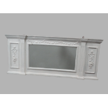 Overmantle Mirror - An early 20th century white painted overmantle mirror with moulded decoration,