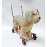 Vintage Toys - An original Lines Bros. of Ireland (Triang) ride along/push along light brown dog