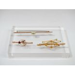 Three Gold Brooches - A Victorian rose gold and 9ct gold hallmarked brooch set a garnet and seed