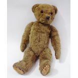 Teddy Bear - An old mohair covered teddy bear with stitched sides, long jointed arms, hump back,