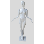 Shop Display Mannequin - A white fibreglass female figure on squared base, height 179cm.