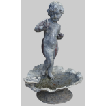 Garden Statuary - A lead putti standing in a scallop shell base (bird bath) decorated with a bird,