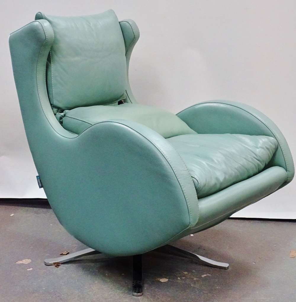 Mid Century Furniture - Fama, a light teal leather Scandinavian design upholstered armchair on