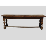 Circa 1700 Long Refectory Table - A four plank top supported on an oak frame with square baluster