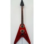 Guitar - A Flying V electric guitar, badged Gibson with solid body and fixed neck, two Humbucker