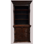 17th Century Oak Bookcase - A four shelf open adjustable height bookcase on a base with frieze
